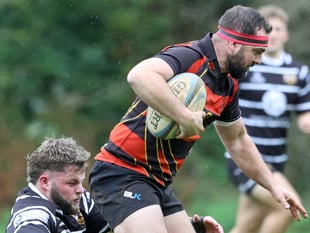 Gillbard's brace helps Lions to third straight league victory 