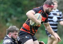 Gillbard's brace helps Lions to third straight league victory