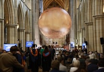 Graduates celebrate under Mars replica