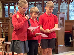 School donates to foodbank after harvest festival service