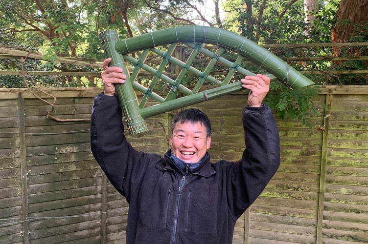 Expert in Japanese bamboo crafting Akihiro Mashimo at Trebah Garden, near Falmouth.Japanese artists travelled to the UK to work with bamboo that grows in a unique Cornish micro-climate. Experts in 'takezaiku' ventured thousands of miles to demonstrate their skills in a plantation at Trebah Garden, near Falmouth.The centuries-old Japanese art translates to "bamboo craft" in English.Over the last 10 years, Trebah Gardens has started to produce some of the largest bamboo canes n the UK because of its unique micro-climate.The 190-year-old sub-tropical garden contains the ideal conditions for growing bamboo, tree ferns, palm trees and magnolias throughout its 26-acre valley.
