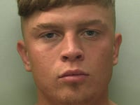 Thief jailed after garage roof standoff
