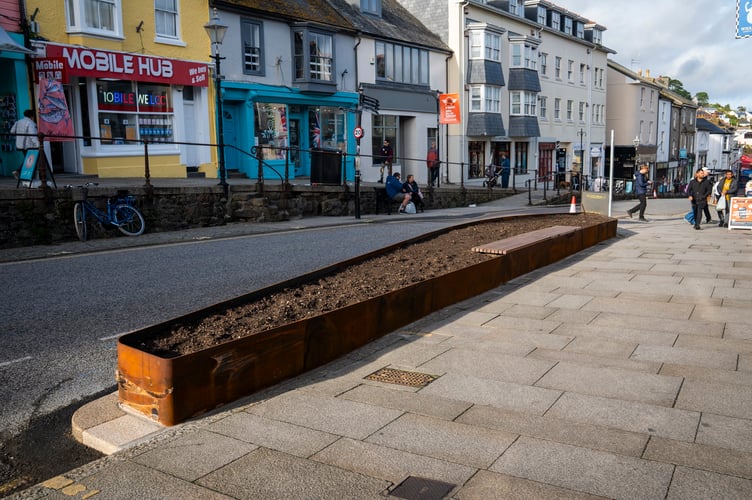 The new planters on Market Jew Street, Penzance. Furious locals of a Cornish town have slammed new planters that look like "giant coffins" and "sardine tins".The large raised flower beds have been set up in Penzance to enhance pedestrian zones in the area.But locals have been quick to comment on their appearance on social media. Pictures show the raised beds encased with metal and filled with soil where the flowers will be planted.