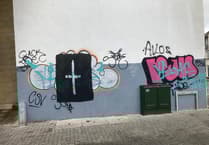 City volunteers tackle graffiti