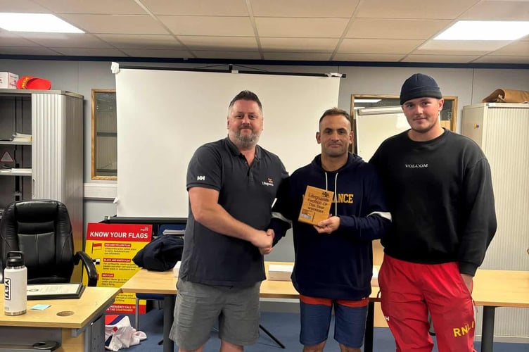 (L-R) Lewis Timson awards Agustin Lanzavechhia and Olly Malkin the rescue footage award for 2025, which will feature in 2026 Saving Lives at Sea series