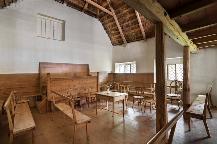 Heritage At Risk 2024 (HAR)
The Friends Meeting House, Come-To-Good, Cornwall.
Interior, general view showing ministers gallery at east end in the form of a wall settle approached by two wooden steps to either side and pine columns supporting loft gallery. View from north west.