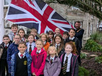 Flag raising ceremony held to mark Remembrance