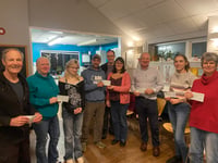 Youth groups celebrate funds raised by local running hero