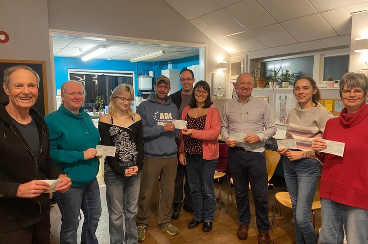 Marathon runner Simon Wengradt was on hand to present cheques to representatives from 17 different groups in the Saltash Youth Network following his marathon efforts earlier this year