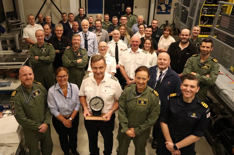 Steve Murray (centre) with friends and family at the Merlin Training Facility 