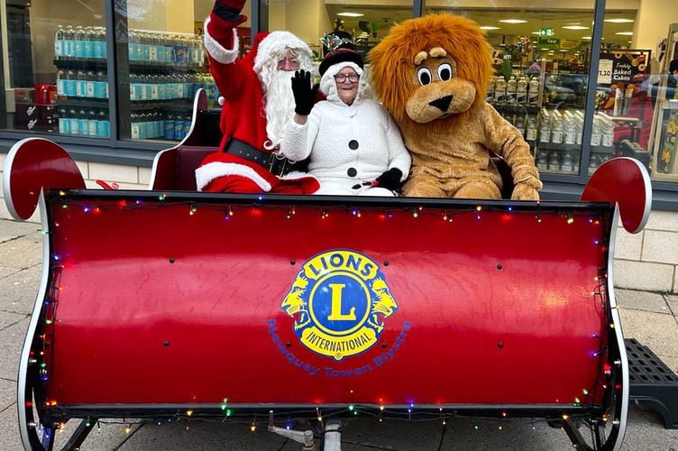 Santa on his sleigh outside Morrisons
