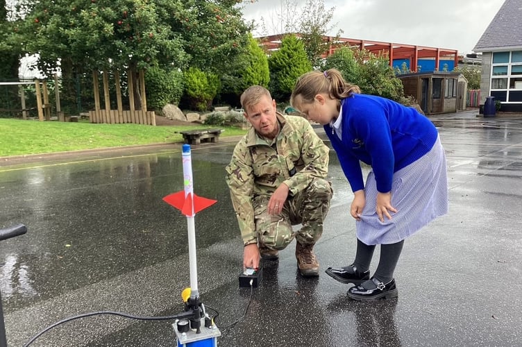 Squadron Leader Leroy Hall led the charge, guiding students through the principles of aerodynamics and propulsion