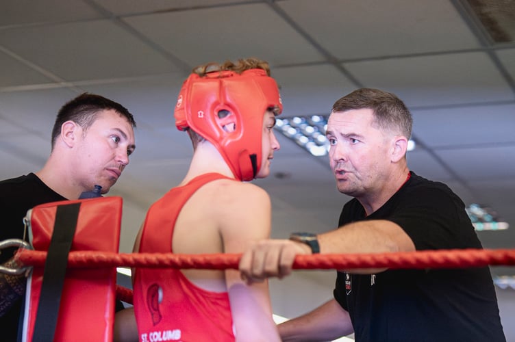 Riley Murphy getting instructions from dad Allan.