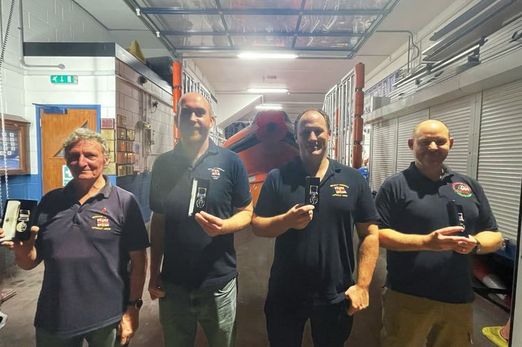 (L-R) Graham Mountford, Richard Martin, Ross King and Christian Brown have been presented with long service awards (Picture: Sam Chapman, Newquay RNLI) 