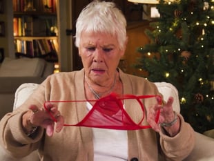 Dame Judi Dench regifts red thong to celebrity friend in charity film 