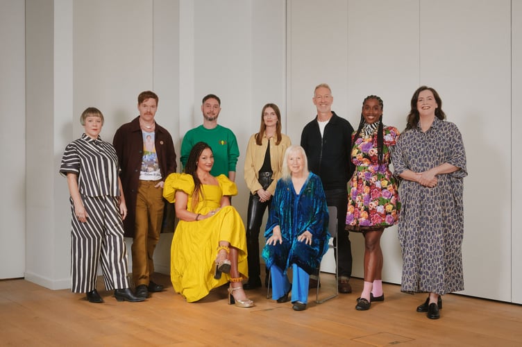 Angeline (in yellow dress) with fellow Paul Hamlyn award winners