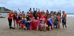Superheroes don their costumes in their fight against cancer