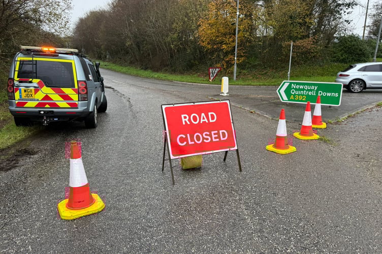 The road was closed while collision investigators examined the scene and the vehicle was recovered (Picture: Adrian Jasper) 