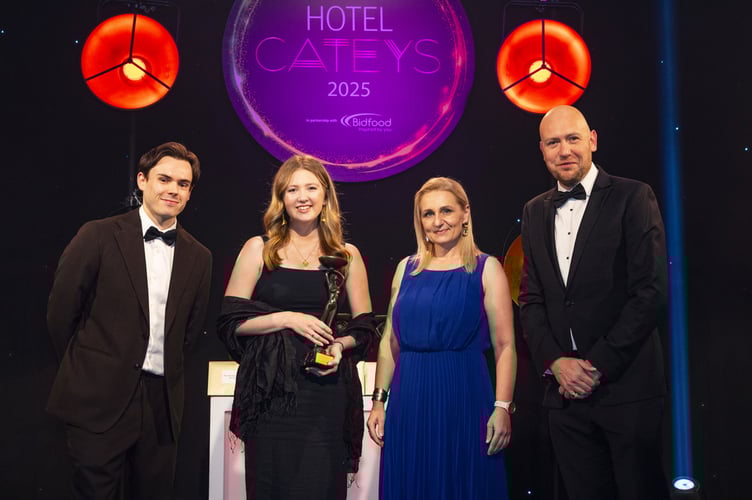 Sustainability lead Bethany Branigan accepts the Sustainable Hotel of the Year award at the Hotel Cateys 2025