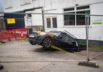 Officials still trying to figure out how to move car stuck in Redruth sink hole