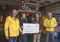 Helford Village Regatta donates money to Falmouth RNLI