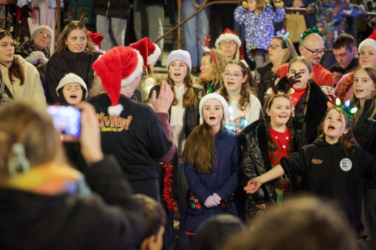 Penzance Musical Theatre Company. 9-year-old Karson Hearley switches on the Christmas lights in Penzance on Saturday 29 November. Photo by Penzance Council