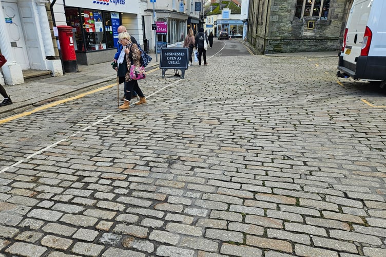 A sign reminding Truro's Christmas shoppers that independent traders in Duke Street and Quay Street are still open in spite of road closures