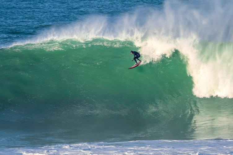 Surfer Tom Major takes the drop (Picture: Geoff Tydeman)