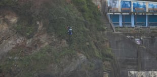 Man rescued after becoming stuck on cliff