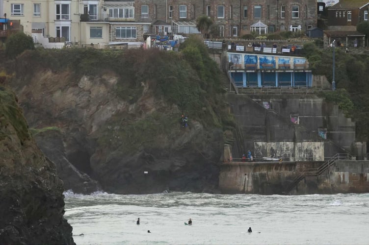 A group of surfers were among those to watch the drama unfold (Picture: MJ Fotos)