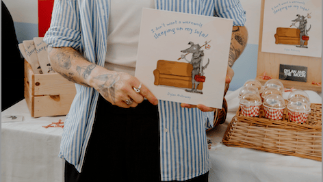 Pop star returns to hometown to showcase their first children's book