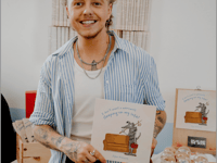 Pop star returns to hometown to showcase their first children's book