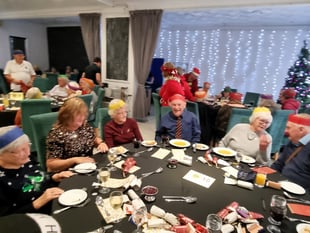 Festive residents tuck into Christmas community lunch