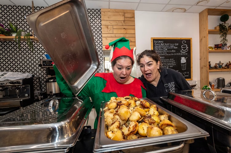 Rachel Battleday, People Manager at Harbour Housing, and volunteer Helen Palmer eyeing up the perfectly roasted potatoes.