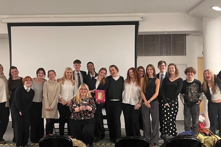 Terrina Dursley, Law Academy Co-ordinator at Truro and Penwith College, law professionals and law academy students celebrate being crowned South West Law Champions.