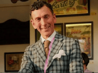 One of two men missing from a Christmas Day swim has been named today.