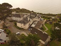 Plan to replace clifftop hotel with 18 new homes