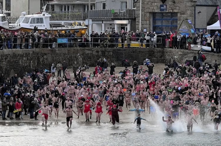 Thousands of spectators gathered to cheer on the brave dippers (Picture: Bob Quinn)