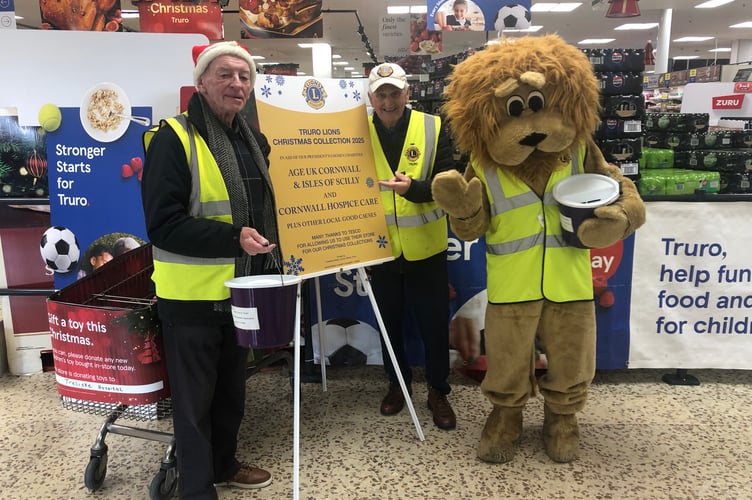 Truro Lions shaking tins in Tesco