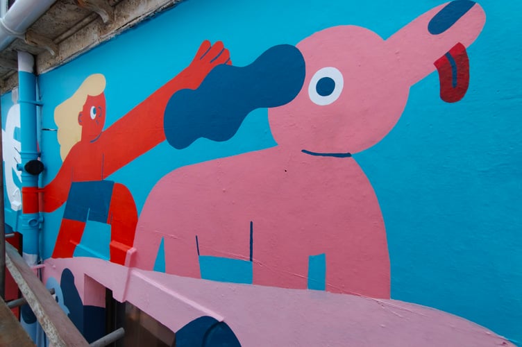 The muralist specialises in bold and colourful designs