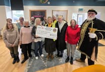 Charity serves up £1,000 donation to help tackle food poverty