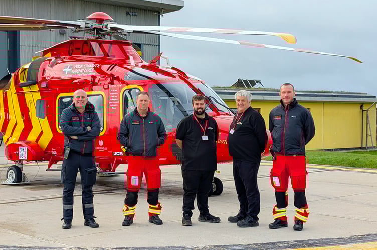 Lappa Valley’s Ben Harding and Keith Southwell meet members of the charities’ aircrew and medical teams in front of Cornwall Air Ambulances newest helicopter Duke of Cornwall