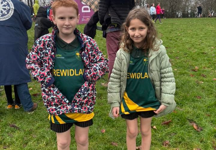 Two of the Trewidland Primary School runners are pictured before their races