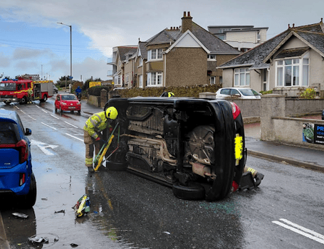 Main route closed after car rolls onto its side in road traffic ...