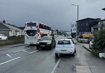 Calls for double yellow lines after car collides with parked vehicle