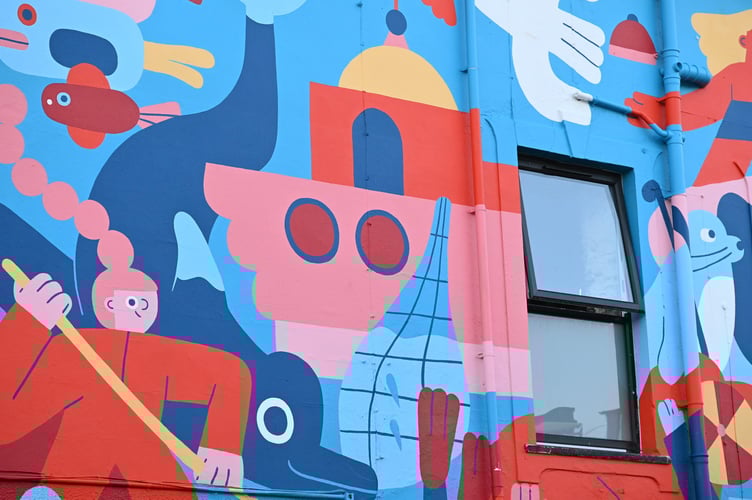 The artwork weaves together nods to its rich history, thriving water sports scene, and lively nightlife (Picture: Bob Quinn)