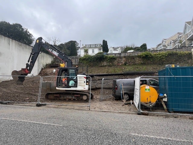 Talland house peeping out from behind the development 
