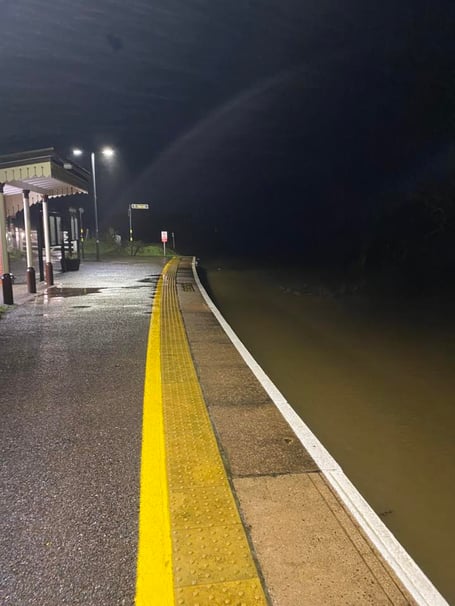 The platform at Sandplace station almost submerged by flood water (Picture: Dave Nichols)