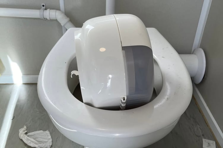 A toilet roll dispenser has been ripped from the wall (Picture: Newquay Town Council)