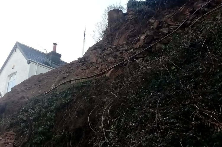 Tonnes of rock and mud fell onto the coast path (Keiron English)